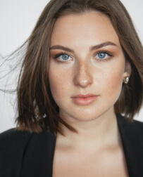 Woman with black jacket avatar.jpg